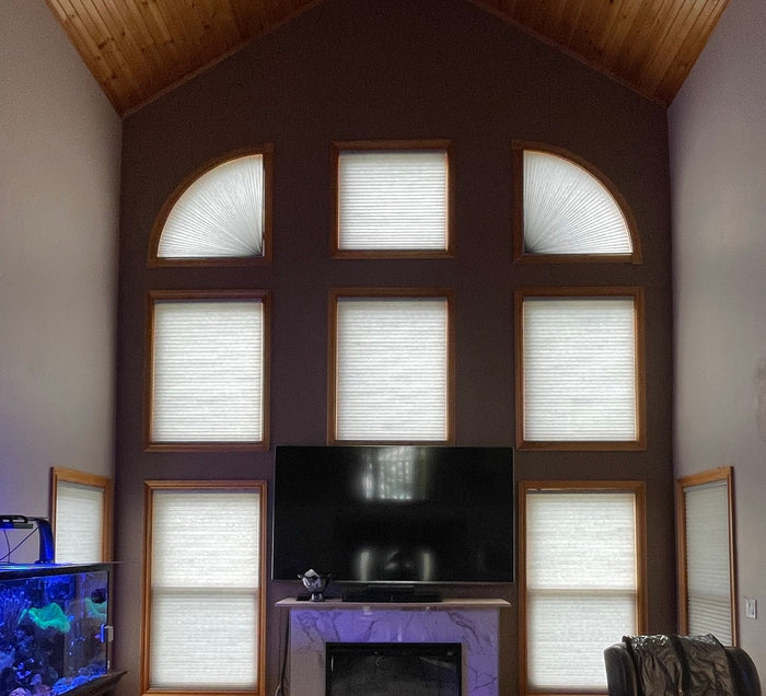 Cellular shades are also an option for those specialty shape windows