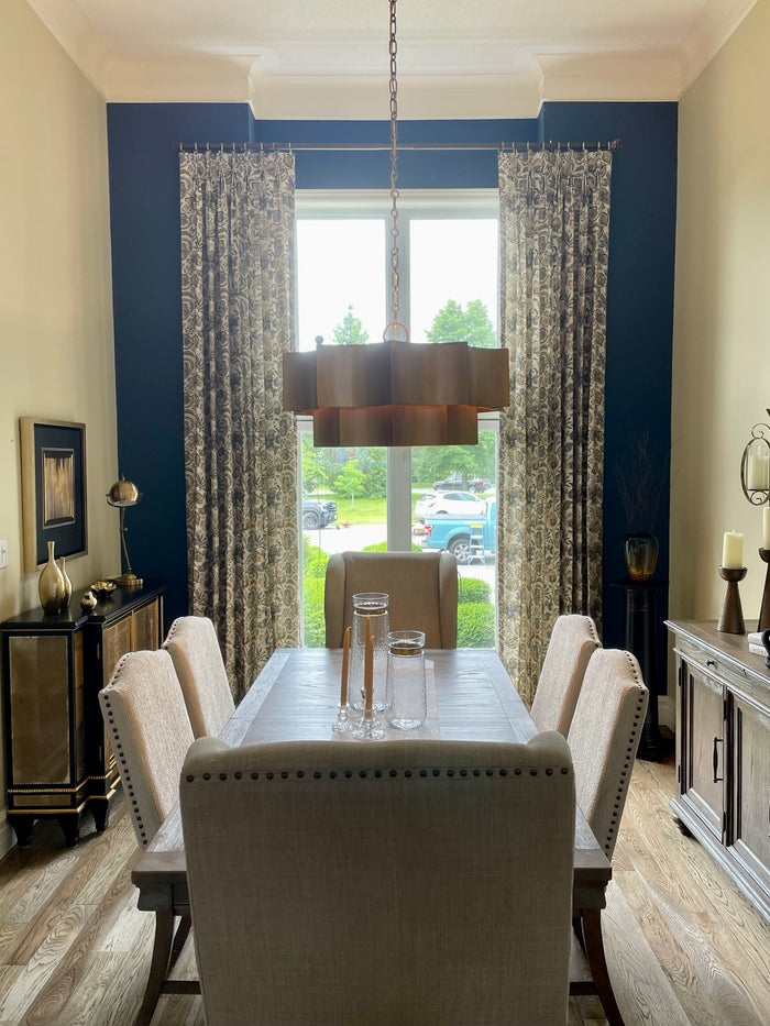 Drapery was the perfect touch to add another layer of luxury in this dining space